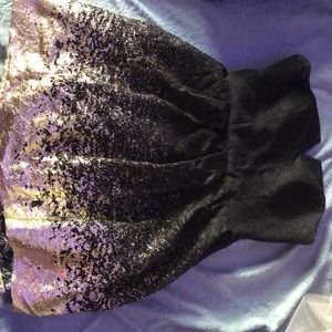 Selling a black and gold homecoming dress!
